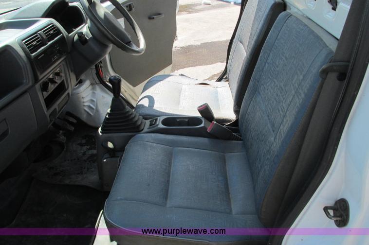 image for item E5072 1999 Mitsubishi minicab truck with dump bed