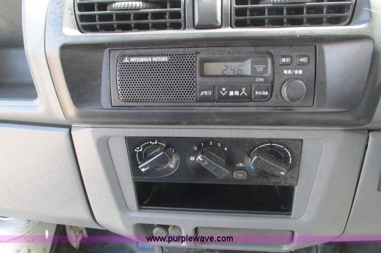 image for item E5072 1999 Mitsubishi minicab truck with dump bed