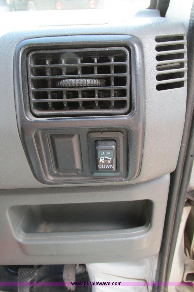 image for item E5072 1999 Mitsubishi minicab truck with dump bed