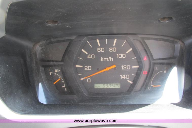 image for item E5072 1999 Mitsubishi minicab truck with dump bed