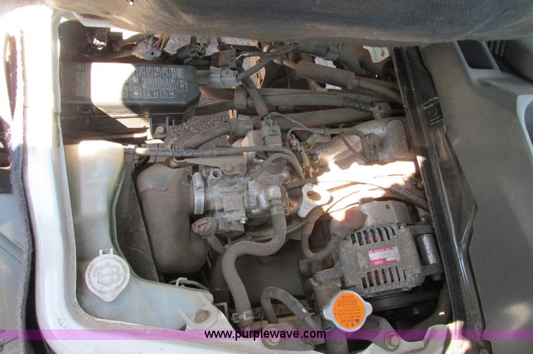 image for item E5072 1999 Mitsubishi minicab truck with dump bed