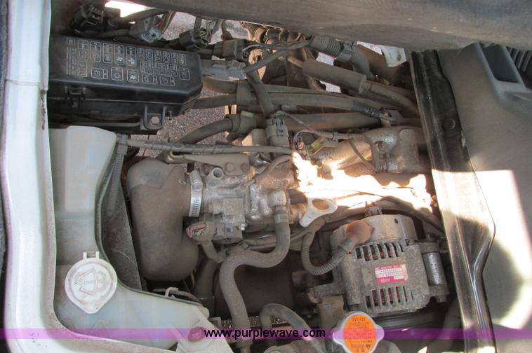 image for item E5072 1999 Mitsubishi minicab truck with dump bed