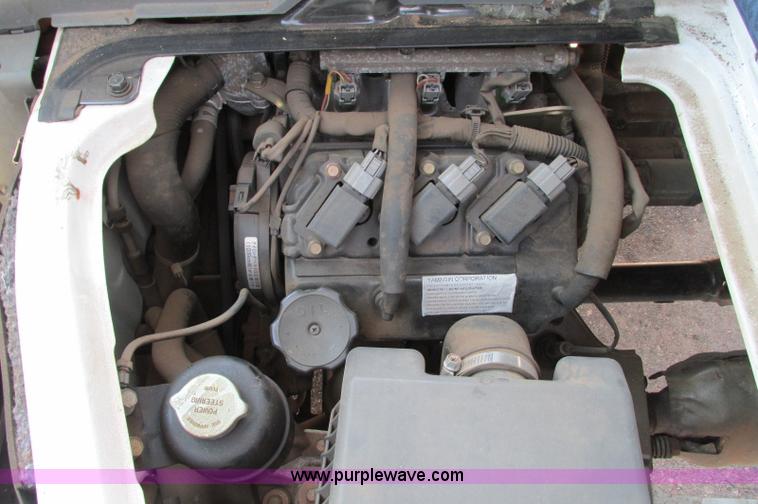 image for item E5072 1999 Mitsubishi minicab truck with dump bed