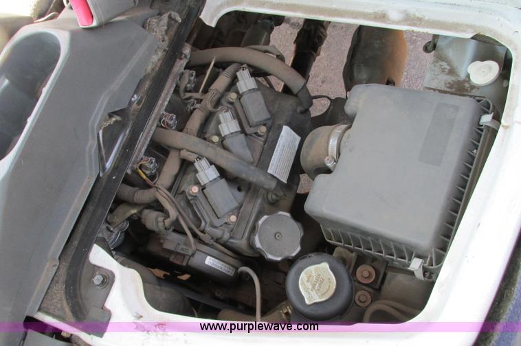 image for item E5072 1999 Mitsubishi minicab truck with dump bed