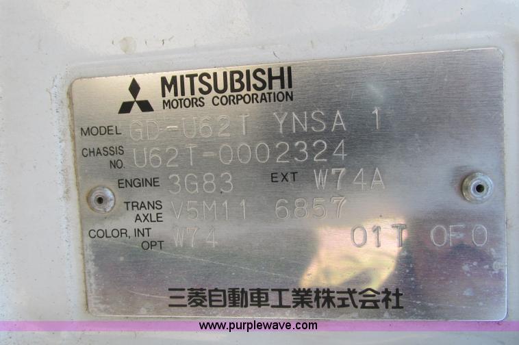image for item E5072 1999 Mitsubishi minicab truck with dump bed