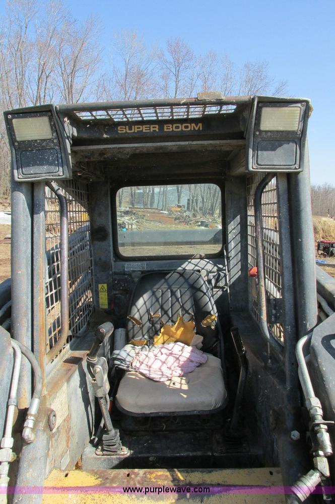 image for item E5117 1995 New Holland LX885 Turbo skid steer