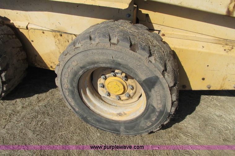 image for item E5117 1995 New Holland LX885 Turbo skid steer