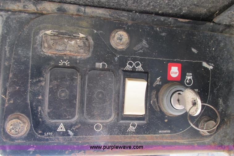 image for item E5117 1995 New Holland LX885 Turbo skid steer