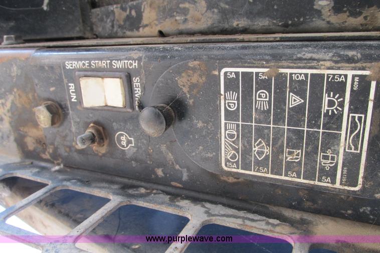 image for item E5117 1995 New Holland LX885 Turbo skid steer