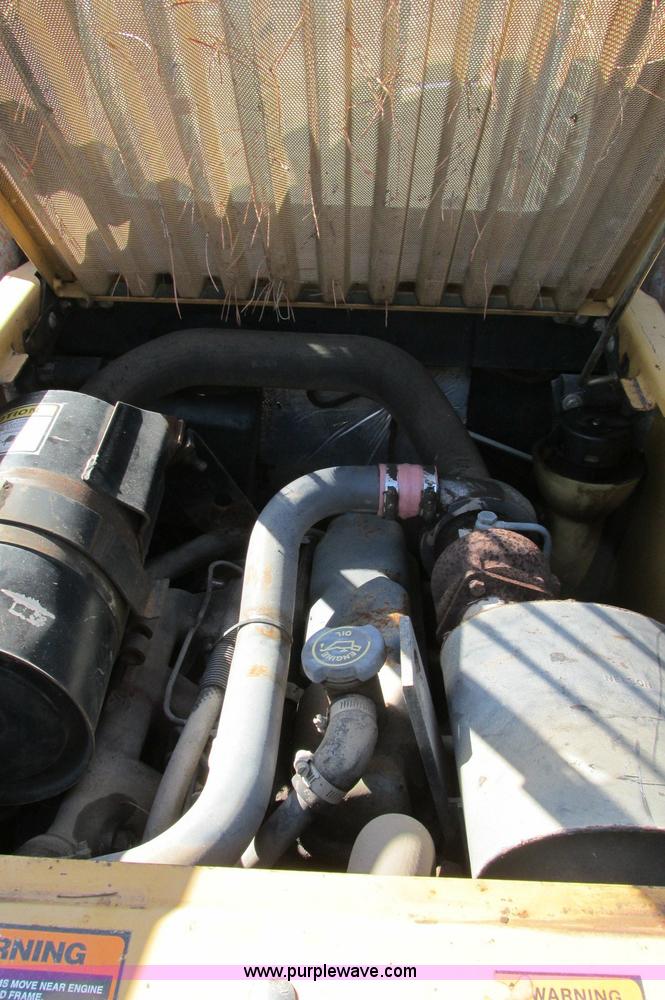 image for item E5117 1995 New Holland LX885 Turbo skid steer