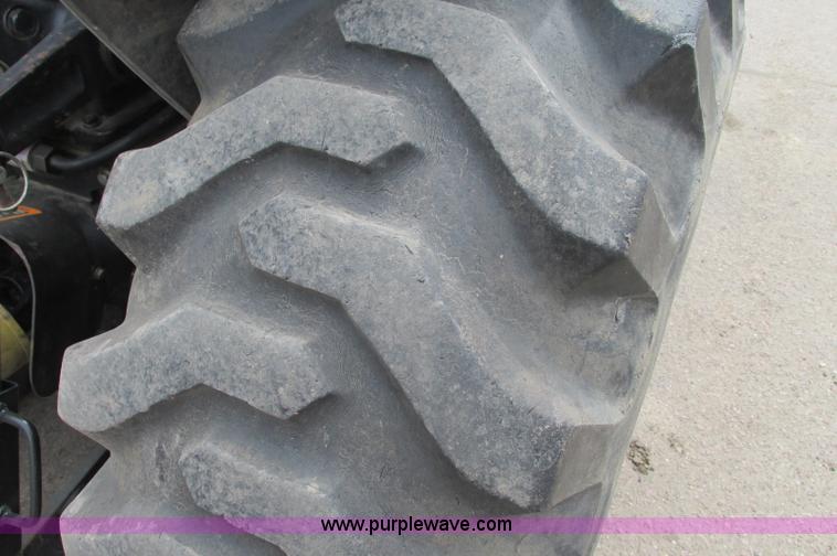 image for item E5131 2002 John Deere 4410 MFWD tractor