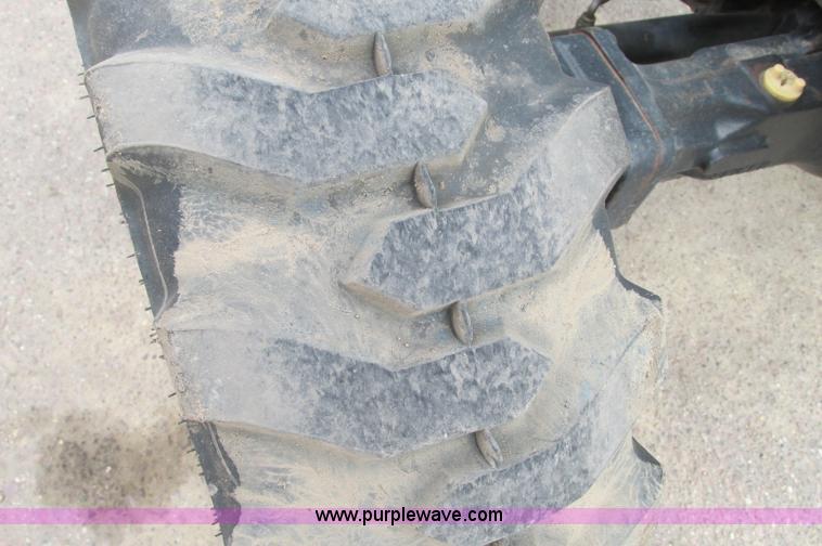 image for item E5131 2002 John Deere 4410 MFWD tractor