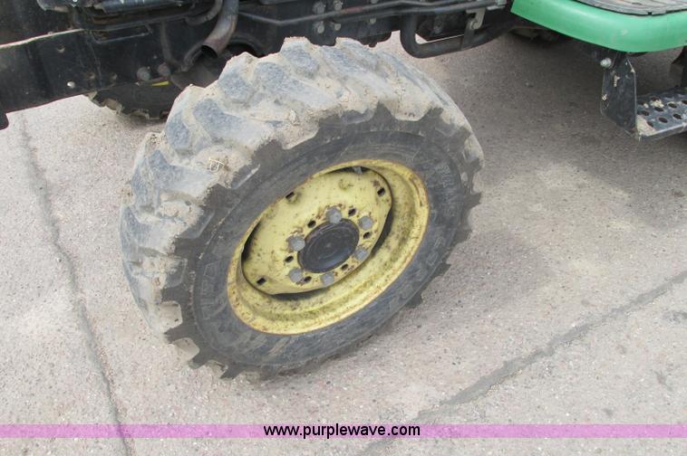 image for item E5131 2002 John Deere 4410 MFWD tractor