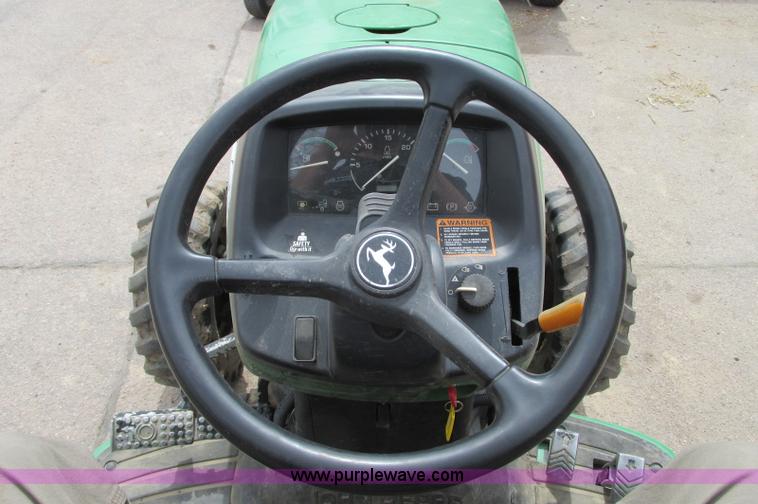 image for item E5131 2002 John Deere 4410 MFWD tractor