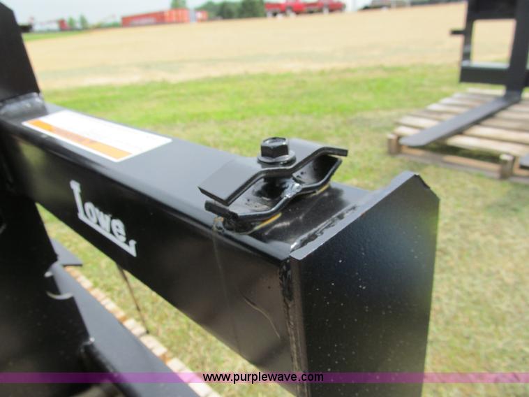 image for item F8587 Lowe 750 CH hydraulic auger attachment