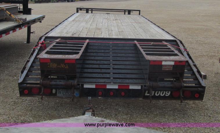 image for item G2932 2007 Load Max triple axle trailer