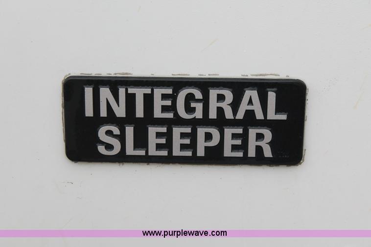 image for item H3576 2002 Volvo VNM420 semi truck