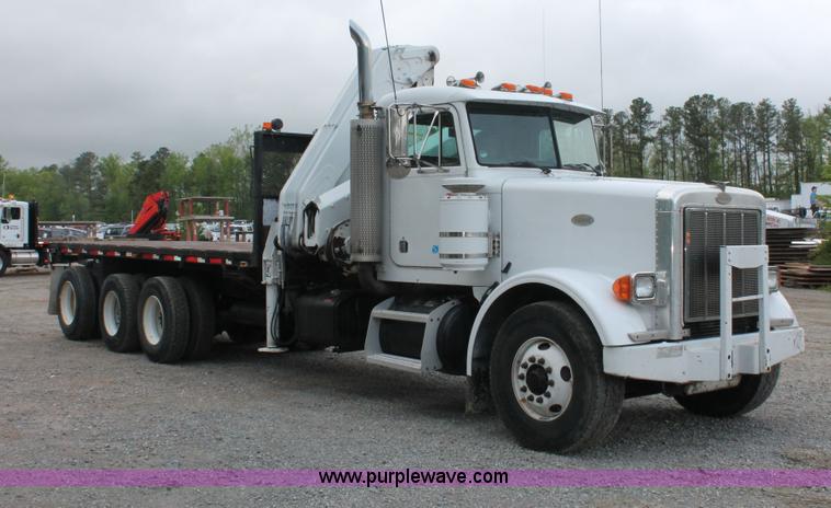 image for item H3580 1998 Peterbilt 320 flatbed truck with knuckle boom crane