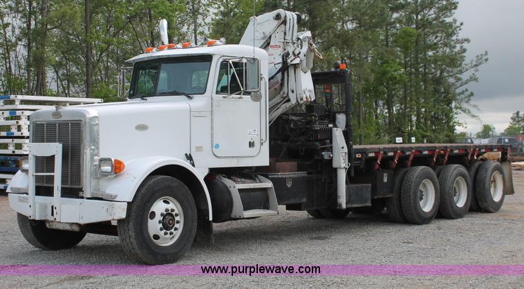 image for item H3580 1998 Peterbilt 320 flatbed truck with knuckle boom crane