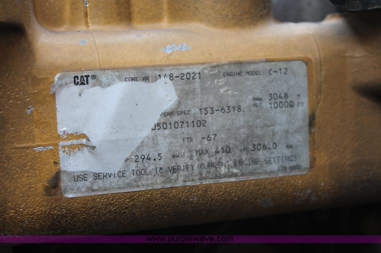 image for item H3580 1998 Peterbilt 320 flatbed truck with knuckle boom crane