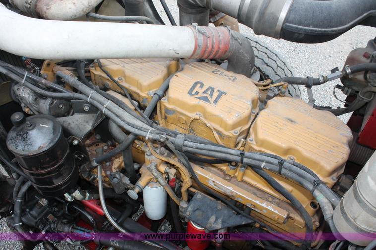 image for item H3580 1998 Peterbilt 320 flatbed truck with knuckle boom crane