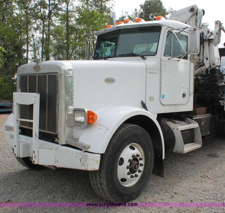image for item H3580 1998 Peterbilt 320 flatbed truck with knuckle boom crane