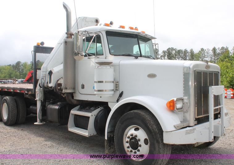 image for item H3580 1998 Peterbilt 320 flatbed truck with knuckle boom crane