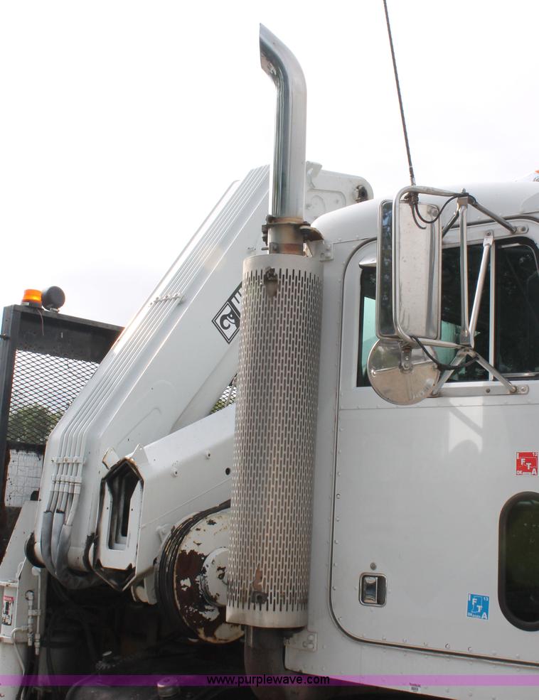 image for item H3580 1998 Peterbilt 320 flatbed truck with knuckle boom crane