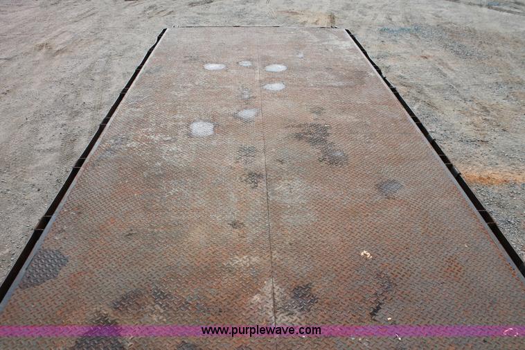 image for item H3580 1998 Peterbilt 320 flatbed truck with knuckle boom crane