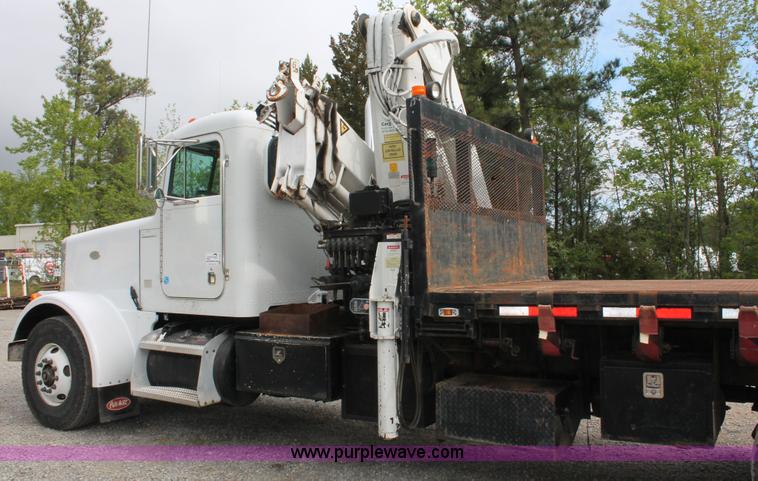 image for item H3580 1998 Peterbilt 320 flatbed truck with knuckle boom crane