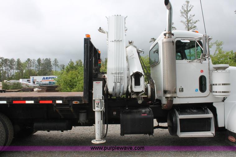 image for item H3580 1998 Peterbilt 320 flatbed truck with knuckle boom crane