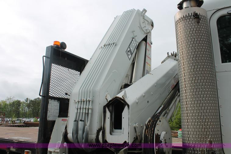 image for item H3580 1998 Peterbilt 320 flatbed truck with knuckle boom crane