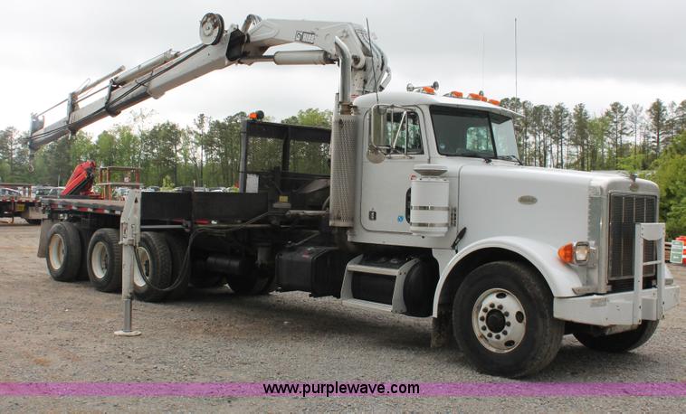 image for item H3580 1998 Peterbilt 320 flatbed truck with knuckle boom crane