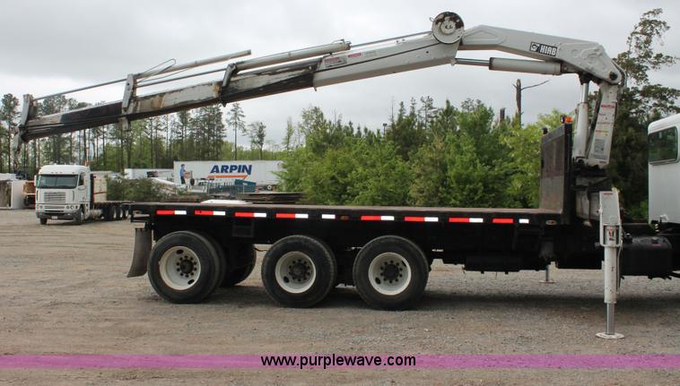 image for item H3580 1998 Peterbilt 320 flatbed truck with knuckle boom crane