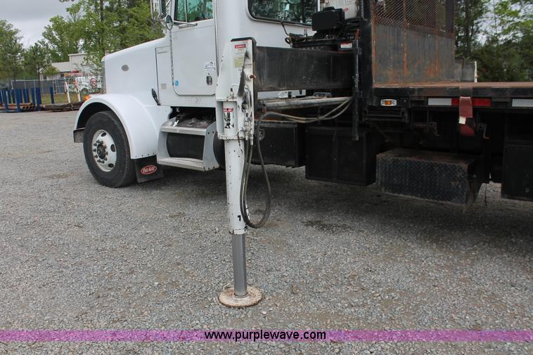 image for item H3580 1998 Peterbilt 320 flatbed truck with knuckle boom crane
