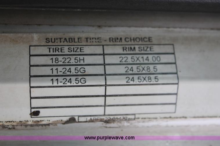 image for item H3580 1998 Peterbilt 320 flatbed truck with knuckle boom crane