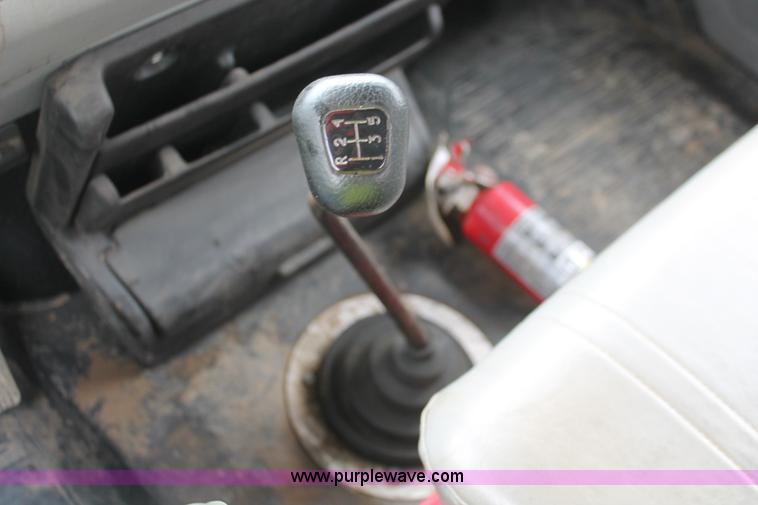 image for item H3582 2001 Freightliner FL70 semi truck