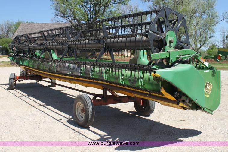 image for item AA9003 1999 John Deere 930 platform header