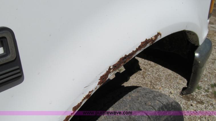 image for item E3920 1993 Ford F350 XL flatbed pickup truck