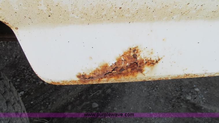 image for item E3920 1993 Ford F350 XL flatbed pickup truck