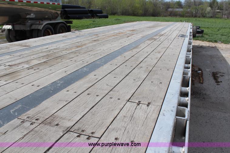 image for item F2890 2011 Transcraft DTL-2100 drop deck trailer