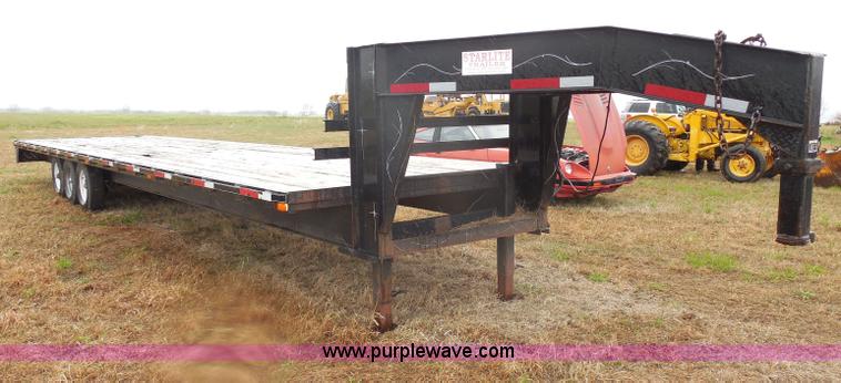 image for item H3228 2002 Starlite Triple axle gooseneck trailer