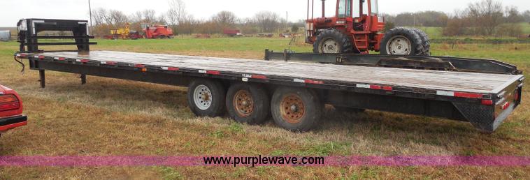 image for item H3228 2002 Starlite Triple axle gooseneck trailer