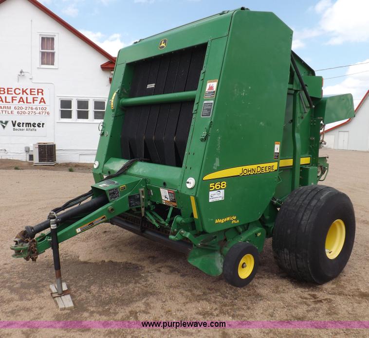 image for item H7111 2008 John Deere 568 round baler