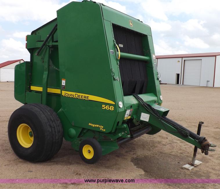 image for item H7111 2008 John Deere 568 round baler