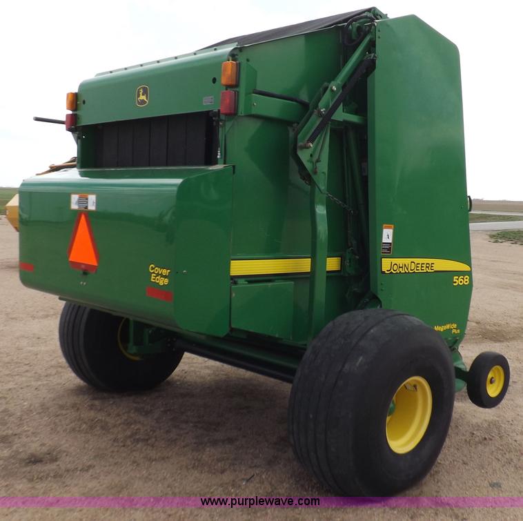 image for item H7111 2008 John Deere 568 round baler