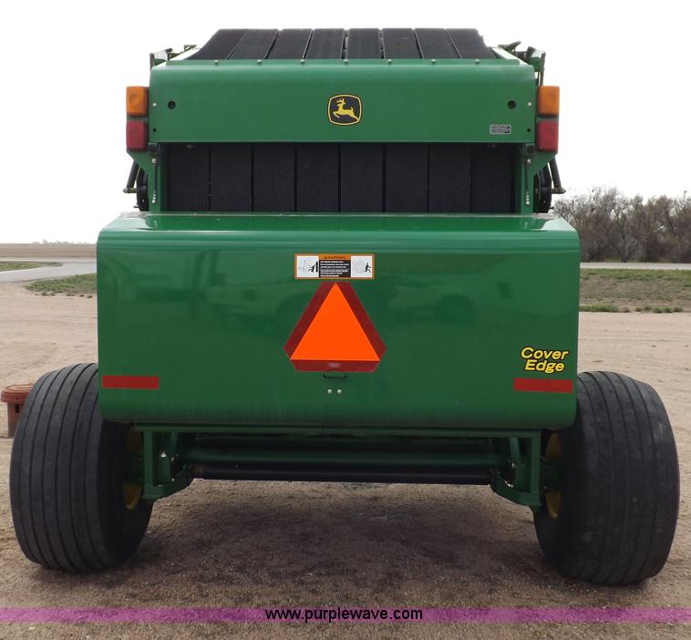 image for item H7111 2008 John Deere 568 round baler