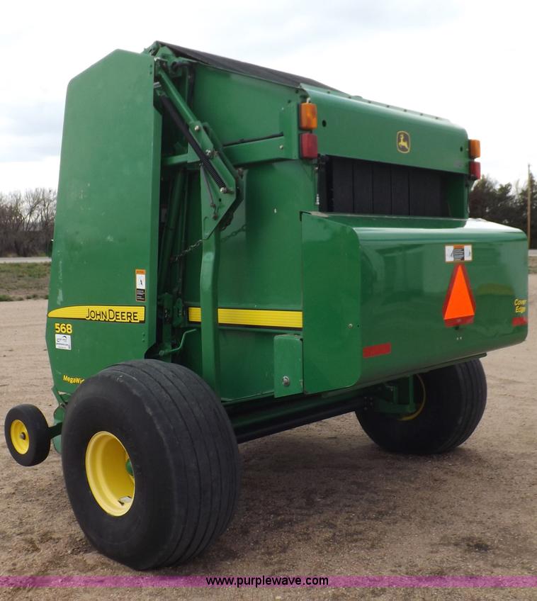 image for item H7111 2008 John Deere 568 round baler