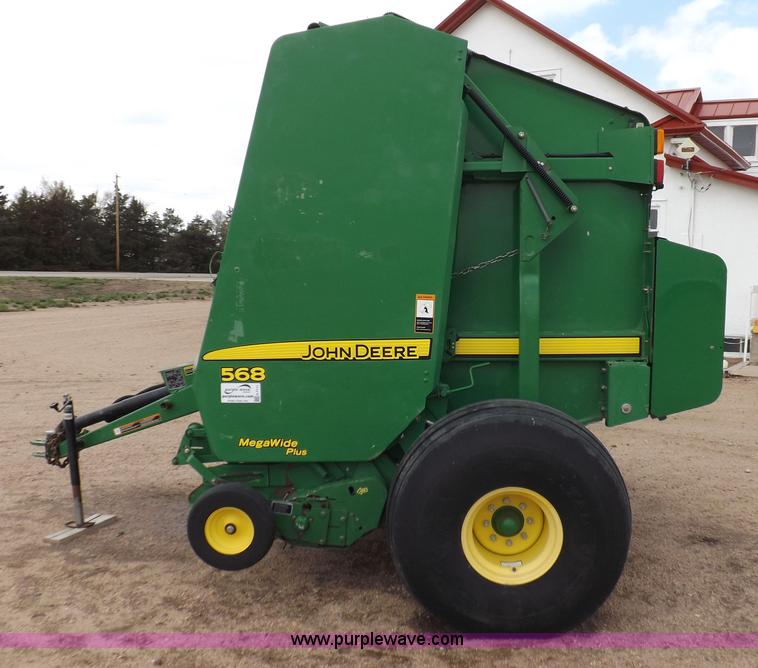 image for item H7111 2008 John Deere 568 round baler