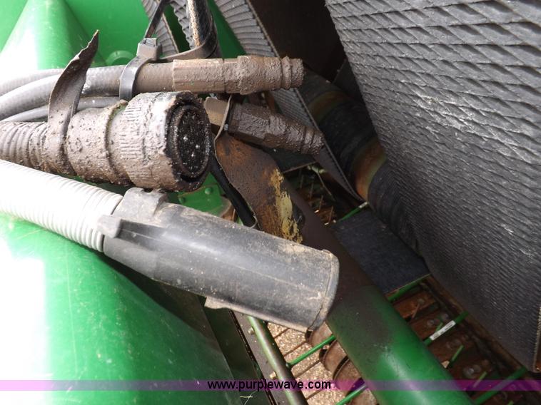 image for item H7111 2008 John Deere 568 round baler